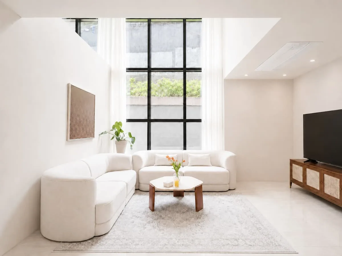 Living room with tall window, 102